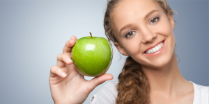 Woman holding an apple
