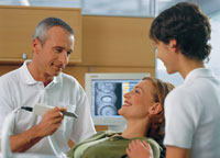 Photo of dentist and patients during a Dentist exam & dental crown preparation in Somerset KY